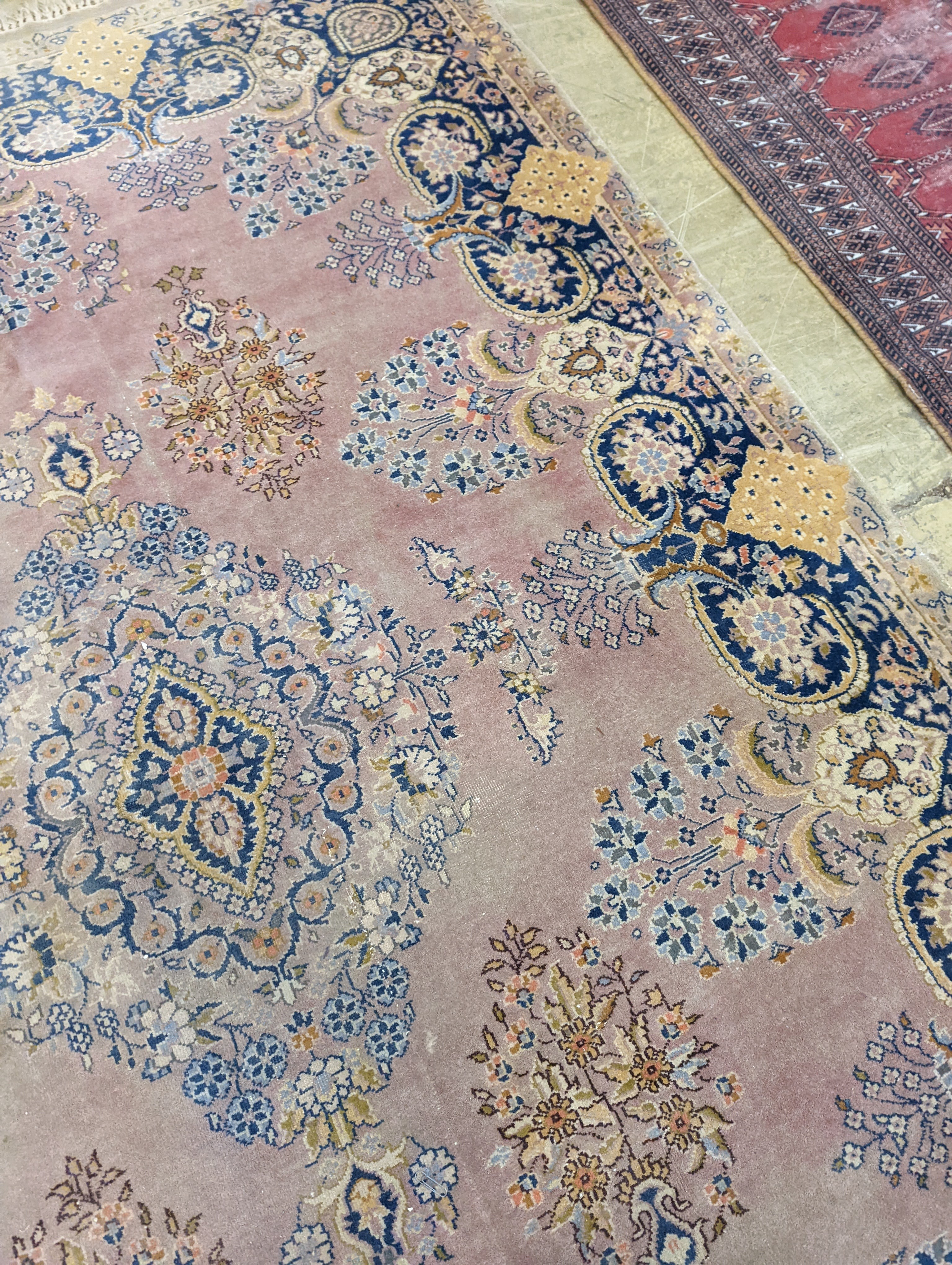 A North West Persian design peach ground carpet, 250 x 170cm